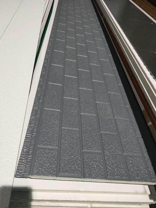 金属雕花板外墙保温装饰一体板在轻钢建筑中的应用